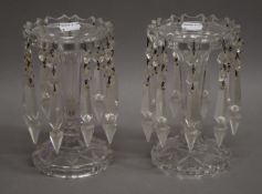 A small pair of Victorian clear glass lustres. 17.5 cm high.