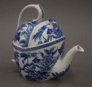 An unusual Wedgwood S.Y.P patent porcelain Peony pattern teapot. 16.5 cm high.