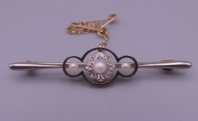 A 15 ct gold diamond and seed pearl brooch. 5 cm wide. 4.7 grammes total weight.