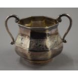 A silver sugar bowl. 11.5 cm wide. 176.1 grammes.