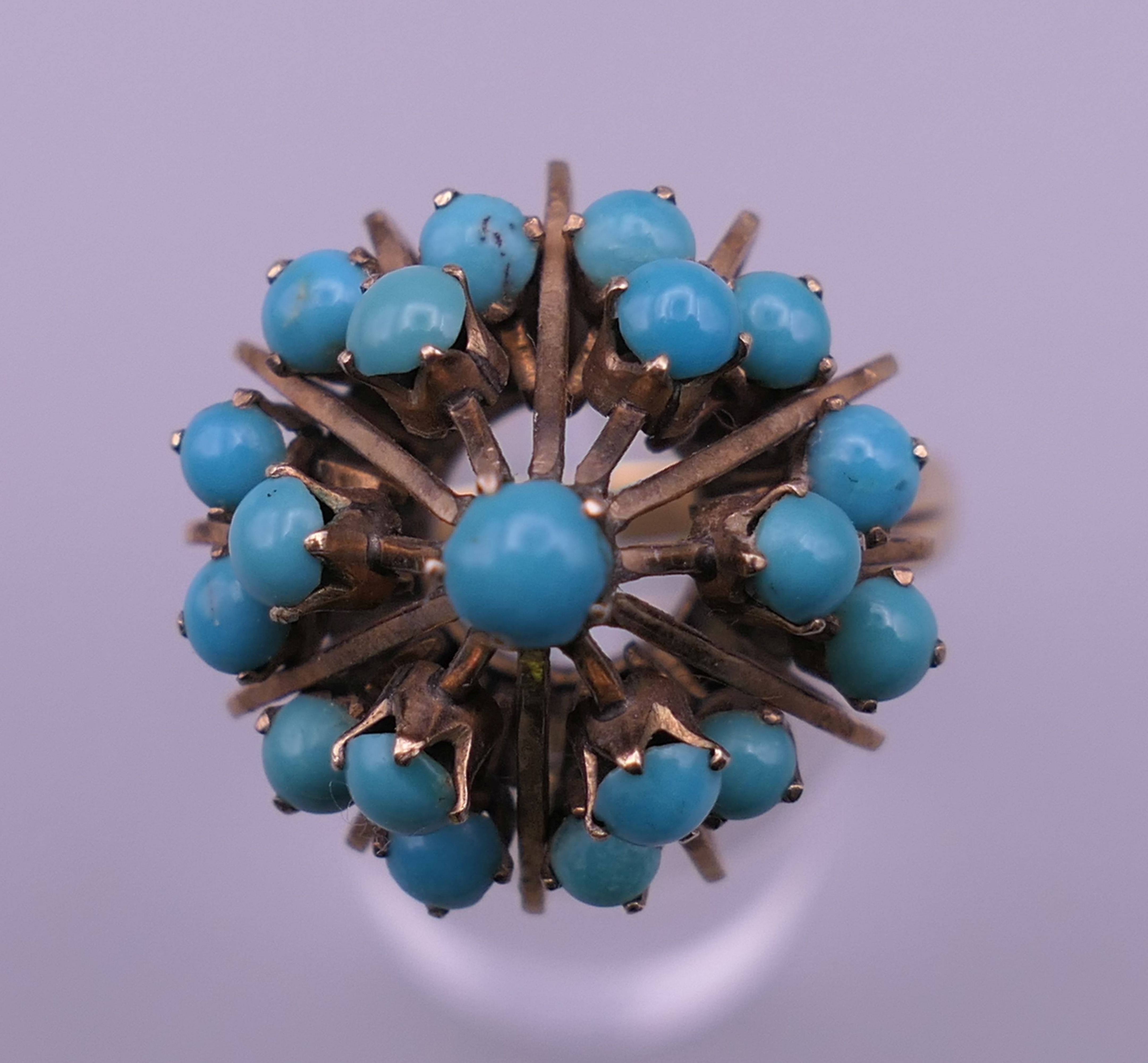 A 14 K gold and turquoise ring. Ring size U. 7.5 grammes total weight. - Image 2 of 8