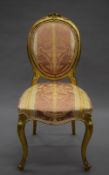 A 19th century upholstered carved giltwood salon chair. 45 cm wide.