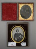 A cased Victorian photograph and another. The former 9.5 cm high.