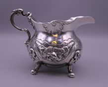 A Victorian silver cream jug. 10 cm high. 237 grammes.