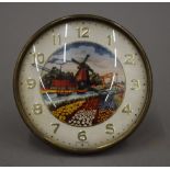 An early/mid 20th century windmill alarm clock.