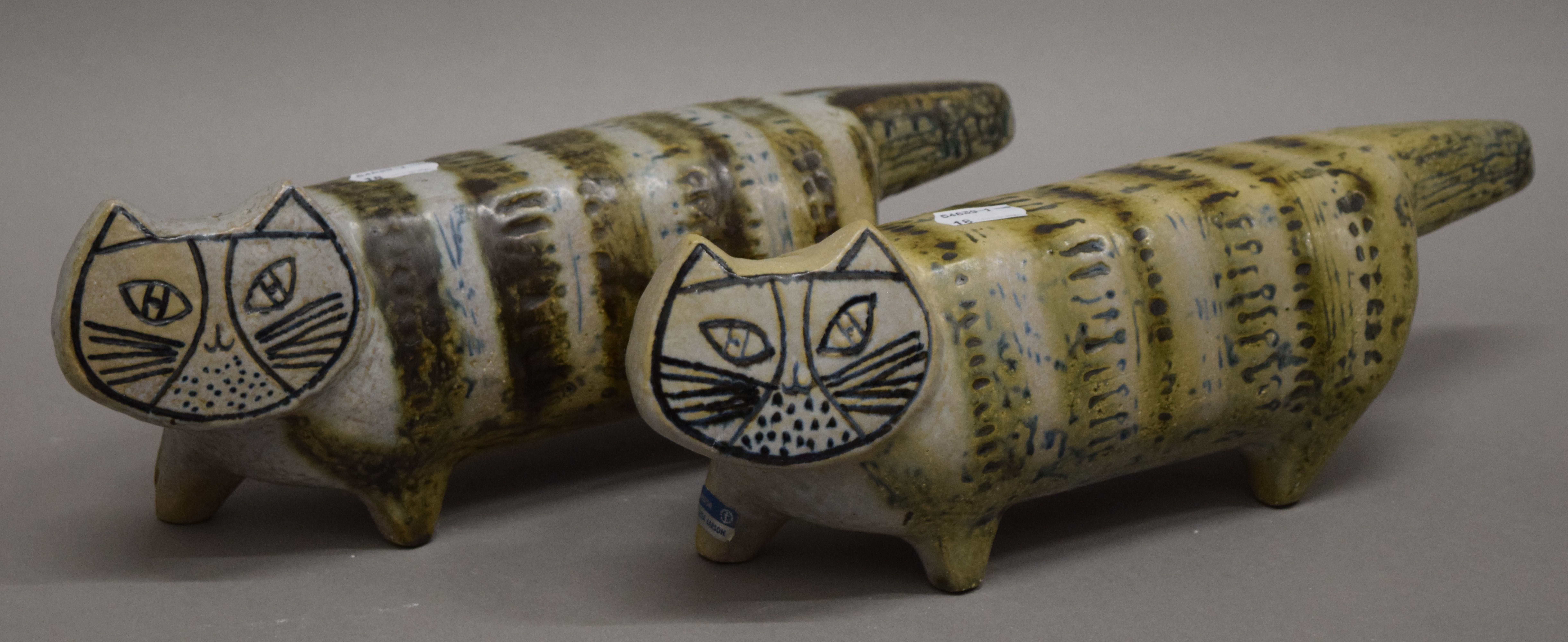 Two Gustavsberg pottery cats. Each 32 cm long.