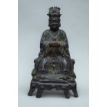 A Ming Period bronze model of an emperor. 26 cm high.