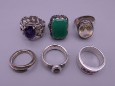 Six various silver rings.