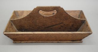 A 19th century oak cutlery tray. 40 cm long.