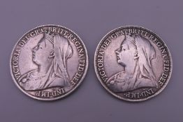 Two Victorian silver crowns, dated 1895 and 1899.