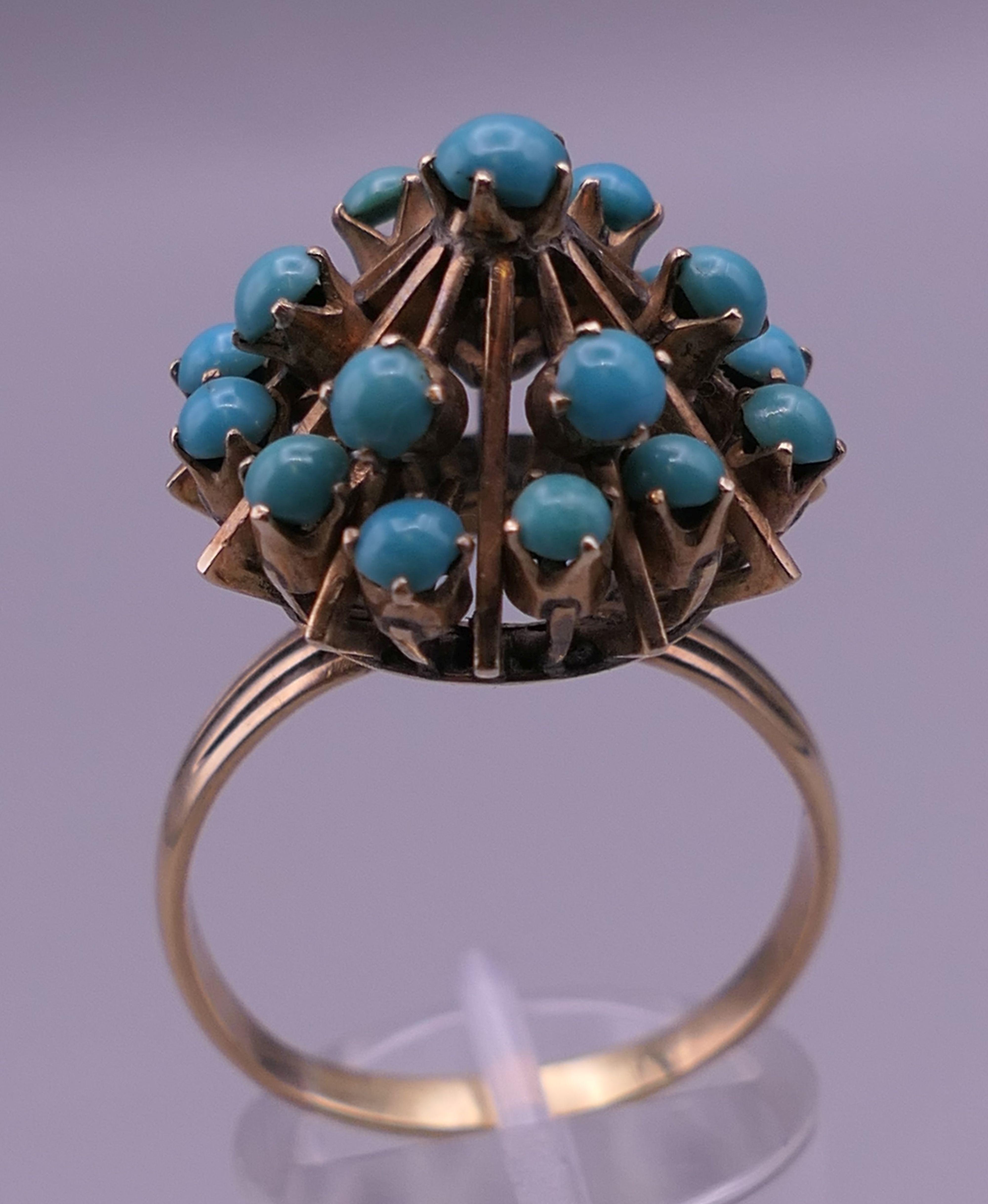 A 14 K gold and turquoise ring. Ring size U. 7.5 grammes total weight. - Image 3 of 8
