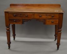 A Victorian mahogany dressing table. 104 cm wide.