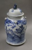 A 19th century Chinese blue and white porcelain lidded jar. 46 cm high.