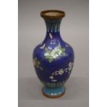 A Chinese blue ground cloisonne vase. 24 cm high.