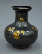 A Japanese lacquered vase, the underside signed. 17.5 cm high.
