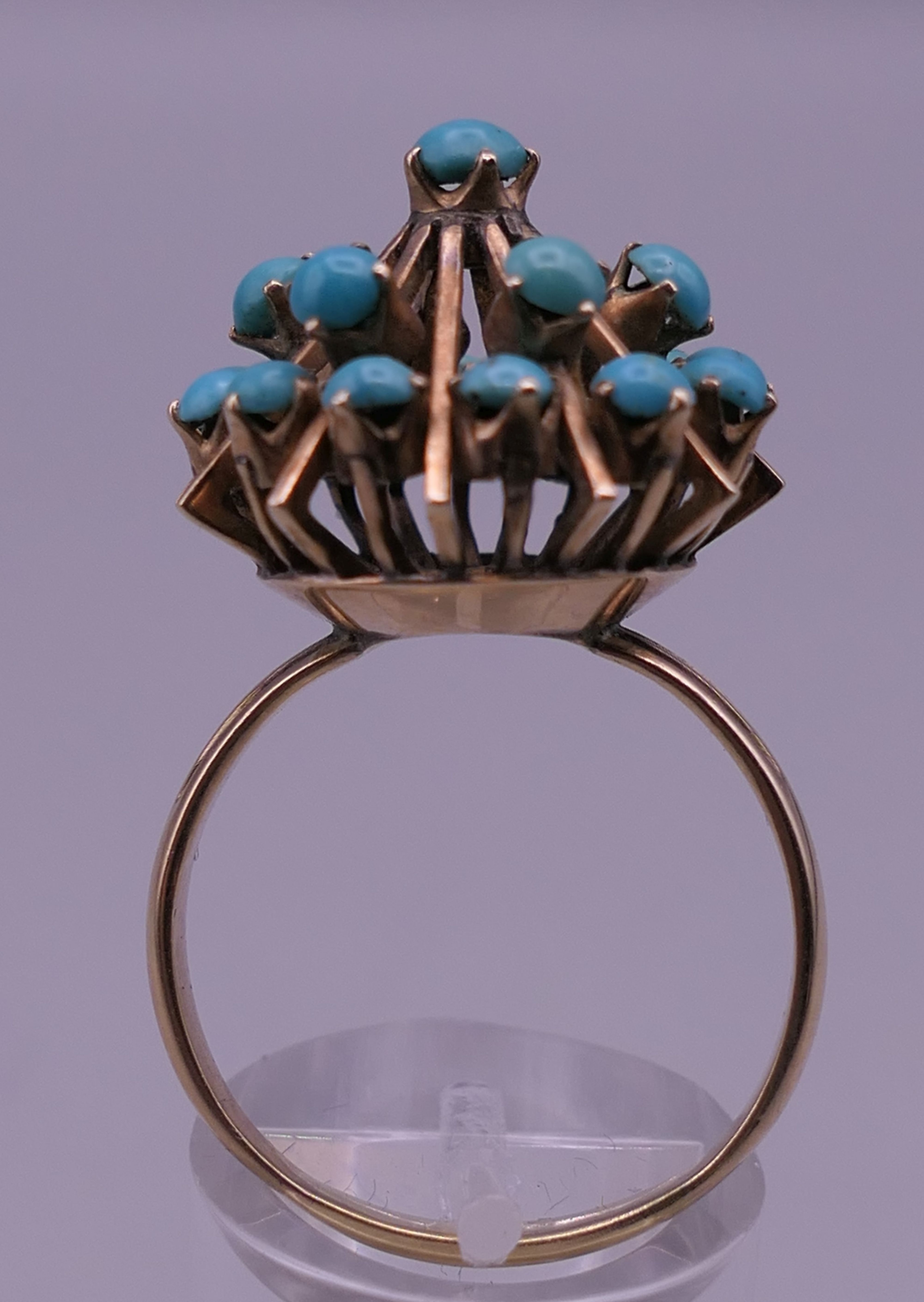 A 14 K gold and turquoise ring. Ring size U. 7.5 grammes total weight. - Image 5 of 8