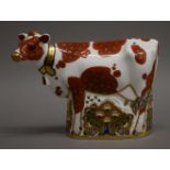 A Royal Crown Derby daisy cow paperweight. 15 cm high.