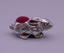A 925 silver rabbit form pin cushion. 3.5 cm wide x 1.75 cm high.