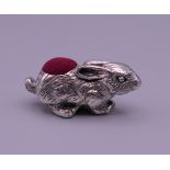 A 925 silver rabbit form pin cushion. 3.5 cm wide x 1.75 cm high.