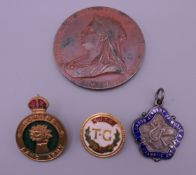 A Victorian Golden Jubilee medallion, two enamel badges, and an enamel and silver pendant.