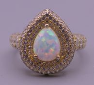A silver opal ring. Ring size P.