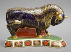 A Royal Crown Derby bull paperweight. 12 cm high.