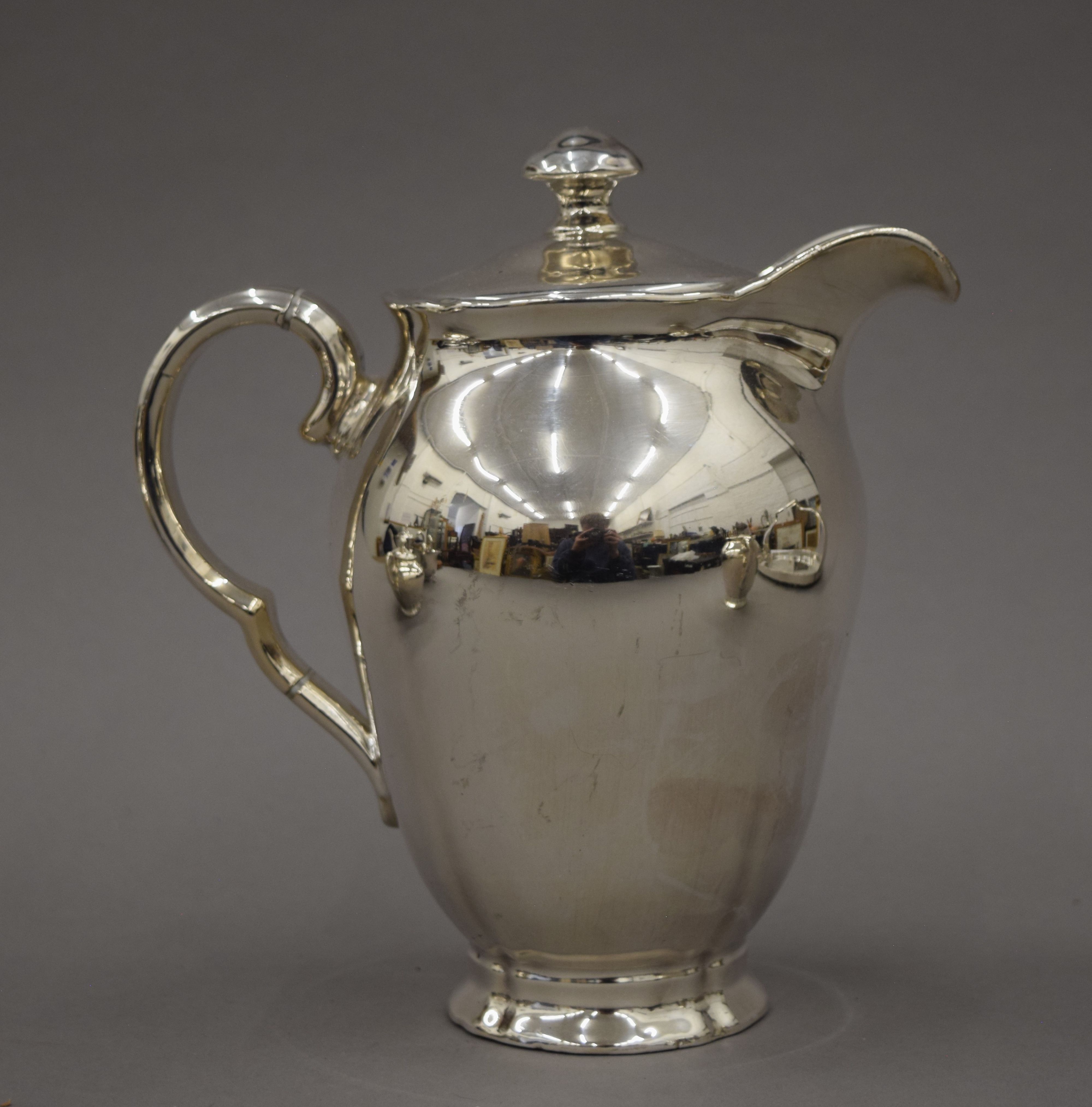 A three-piece silver plated tea set and a three-piece porcelain and silver overlaid tea set and an - Image 5 of 10