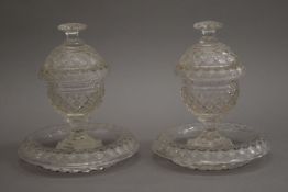 A pair of 19th century hobnail cut glass lidded vases and a small pair of dishes. The former 17.