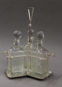 A Christopher Dresser style decanter stand. 35 cm high.