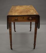 A 19th century mahogany Pembroke table. 50 cm wide flaps down.