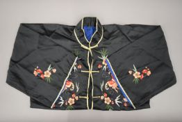 A Chinese embroidered jacket.