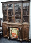A 19th century mahogany breakfront bookcase of small proportions. 139 cm wide, 190 cm high.