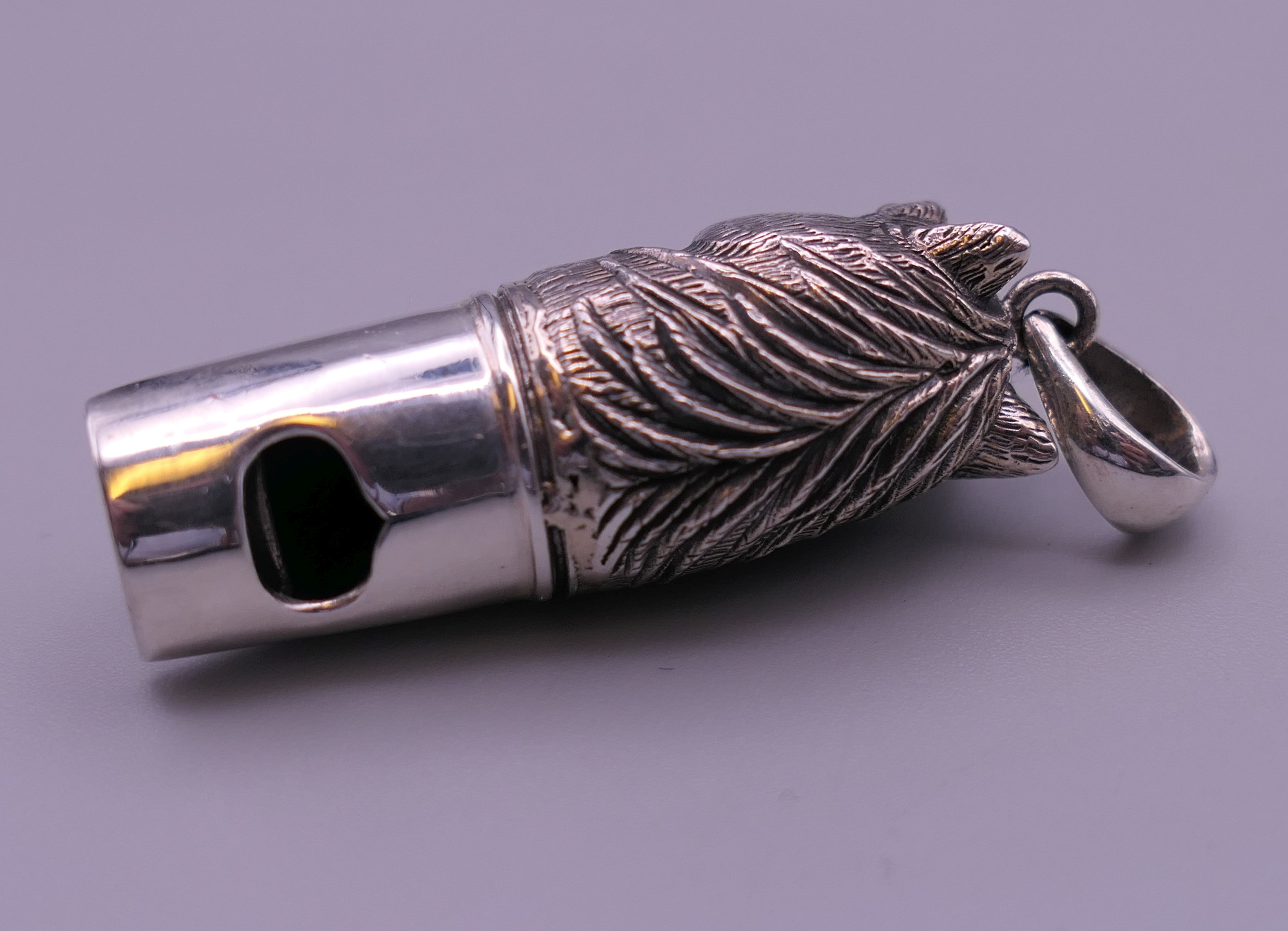 A 925 silver whistle in the form of a horse's head. 4 cm high excluding suspension loop. - Image 4 of 6