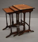 An early 20th century nest of three tables. 46.5 cm wide.
