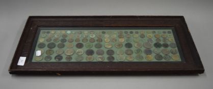 A framed coin display, ranging from Roman to early Victorian. 65 x 28.5 cm overall.