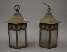 A pair of early 20th century hexagonal hanging lanterns. 25 cm high excluding hooks.