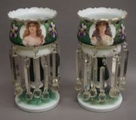 A pair of Victorian glass lustres decorated with female portraits. 35.5 cm high.