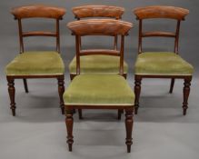 A set of four Victorian mahogany bar back dining chairs. 48 cm wide.