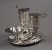 A silver plated riding boots cruet. 16.5 cm long.