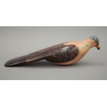 A decoy pigeon. 36 cm long.