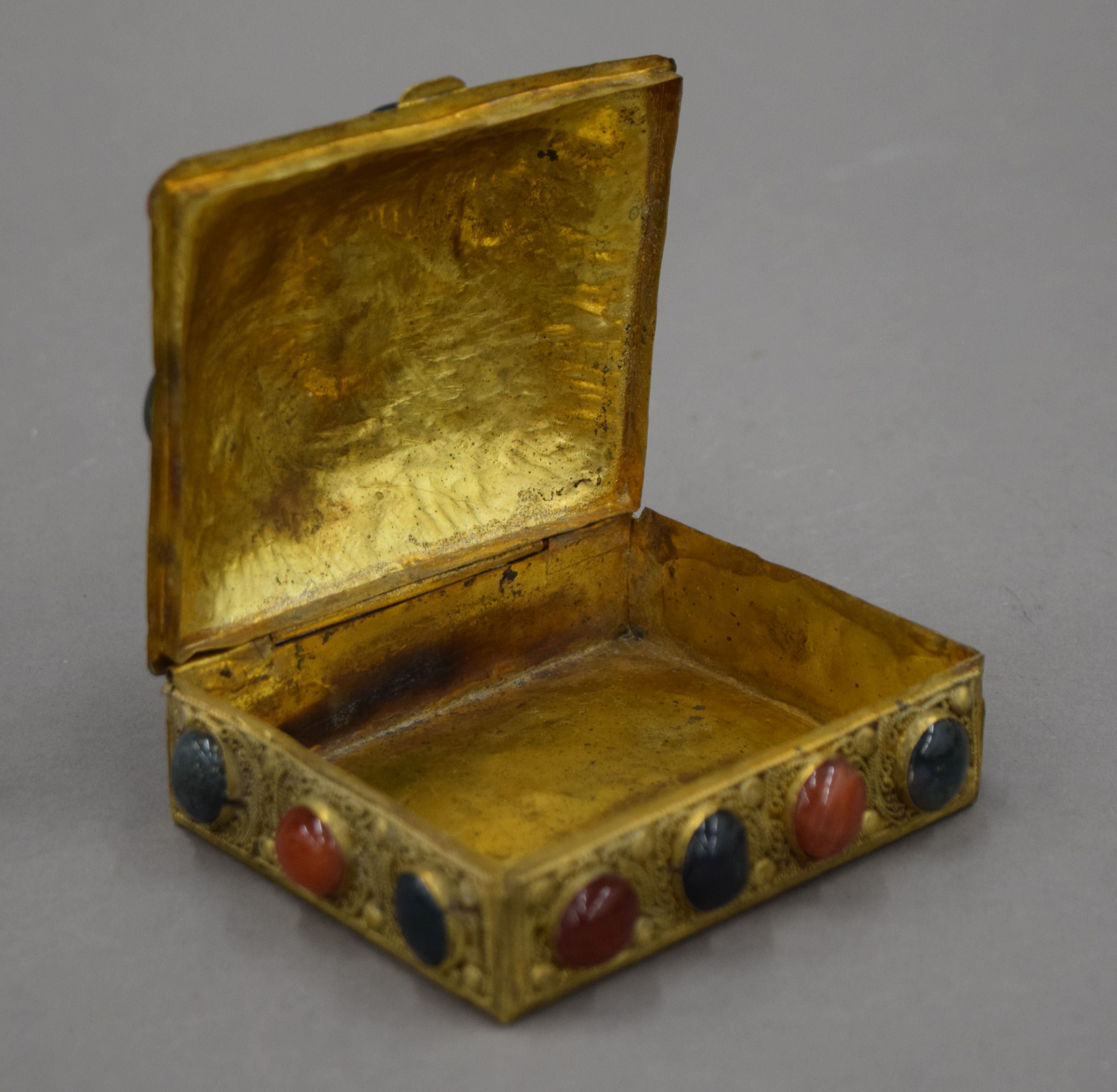 An Indian gilt box set with cabochon stones. 11 cm wide. - Image 4 of 4