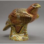 A large Royal Crown Derby limited edition golden eagle paperweight with gold mark. 23 cm high.