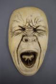 After FRANZ XAVER MESSERSCHMIDT, a plaster Screaming Mask. 22 cm high.