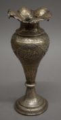 An Eastern unmarked silver vase. 22 cm high.