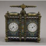 A cloisonne double clock/barometer. 12.5 cm wide.