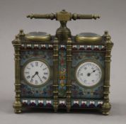 A cloisonne double clock/barometer. 12.5 cm wide.