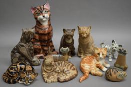 A collection of pottery cats.