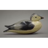 A decoy duck, possibly a smew. 27 cm long.