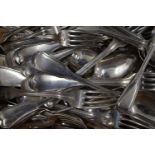 A quantity of Georgian silver flatware, comprising: 2 large serving/basting spoons,