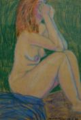 A pastel study of a Nude Redhead Woman, indistinctly signed, dated 19.1.89, framed and glazed. 43.